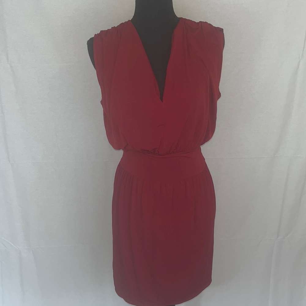 This is a red dress in a size small.